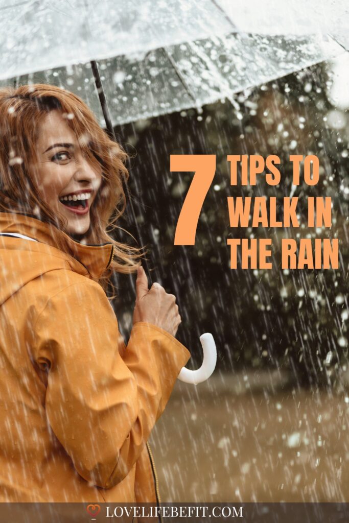 image of woman standing in the rain with an umbrella