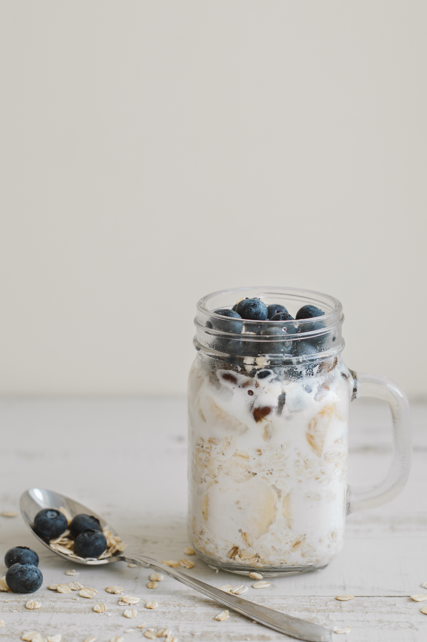 image of blueberry banana overnight oats in a jar