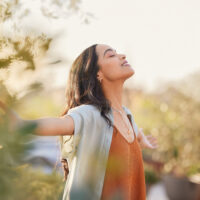 Image of a young woman enjoying the benefits of mindfulness