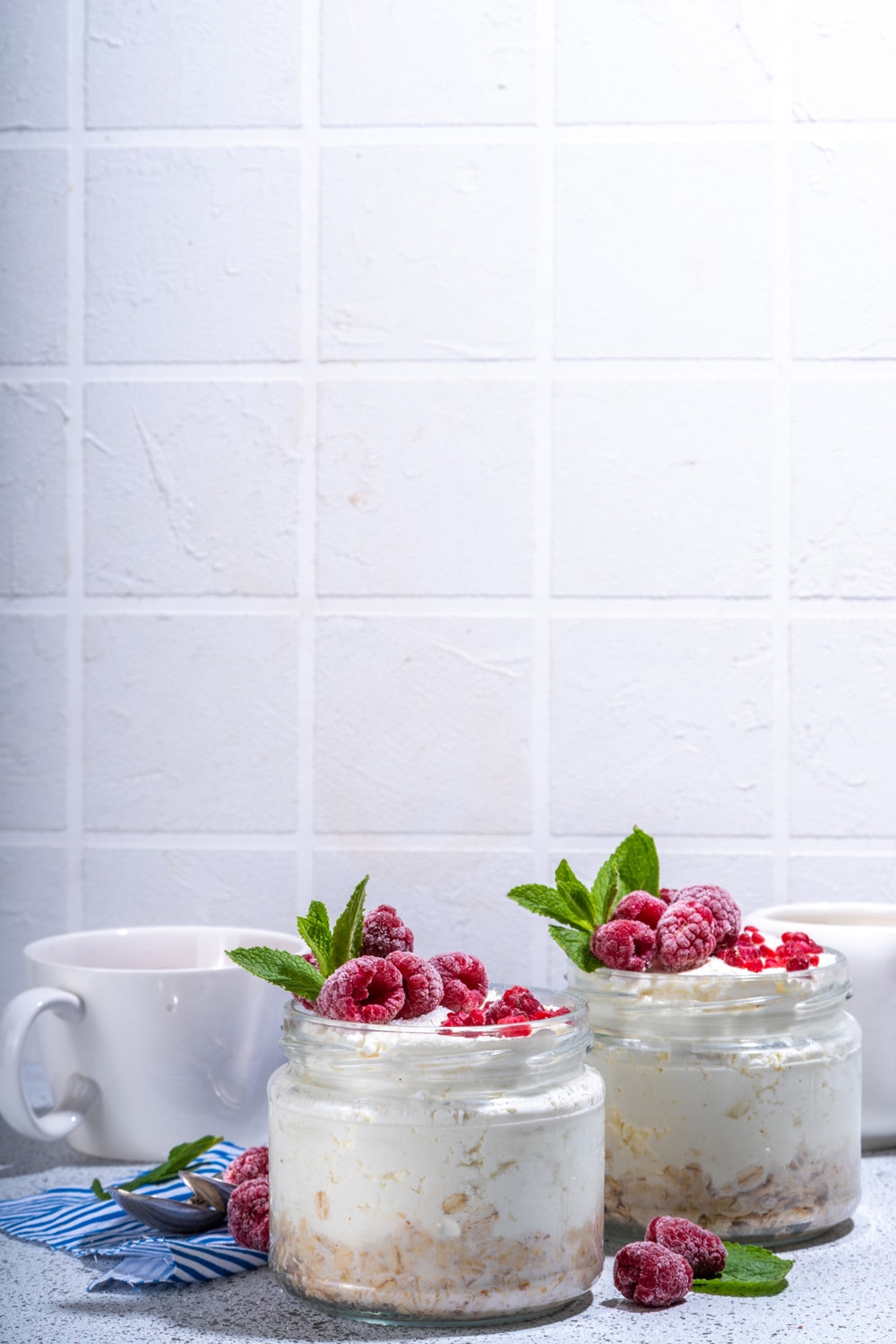 Image of raspberry cheesecake overnight oats in a kitchen setting