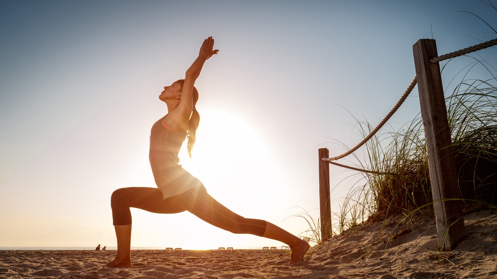 Image of woman following a yoga sequence of yoga poses for runners