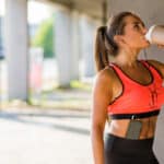 Image of a woman drinking a protein shake