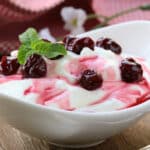 Image of healthy bedtime snacks - sour cherries and yogurt