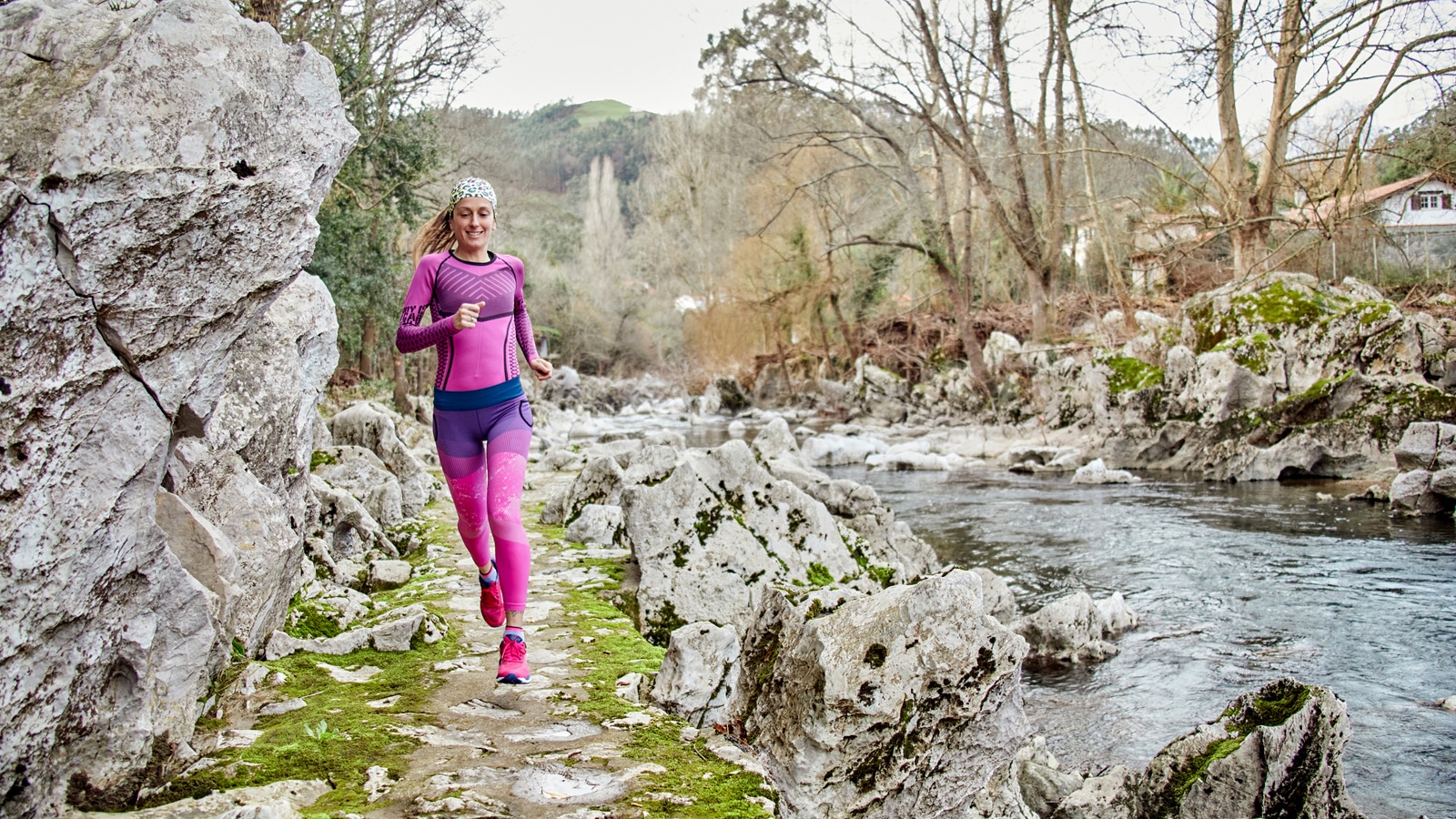 Image of a woman running in winter wearing her new Christmas running gifts
