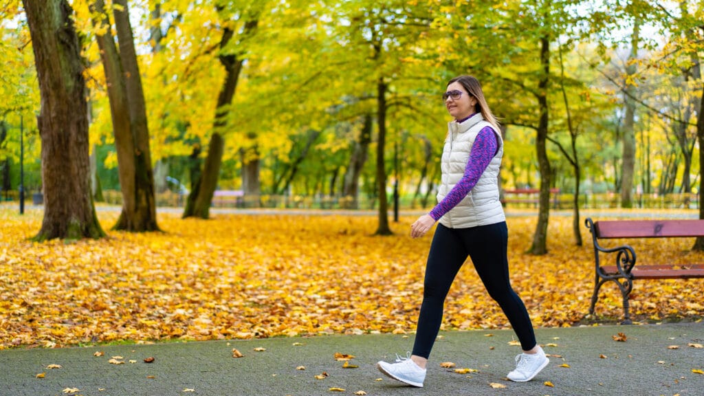 Image of a woman walking to lose weight
