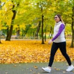 Image of a woman walking to lose weight