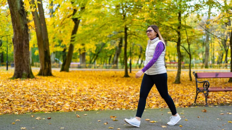 Image of a woman walking to lose weight