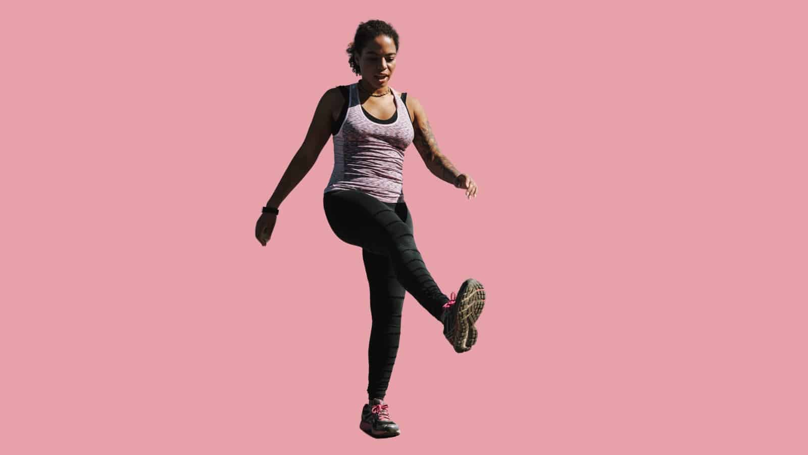 Image of a woman walk forward and kick exercise