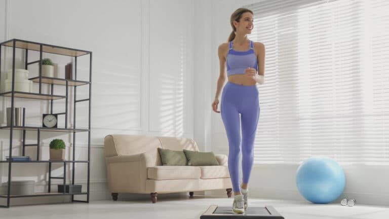 Image of a woman doing an indoor walking workout