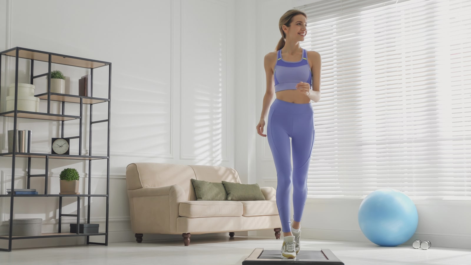 Image of a woman doing an indoor walking workout