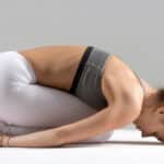 woman in child's pose