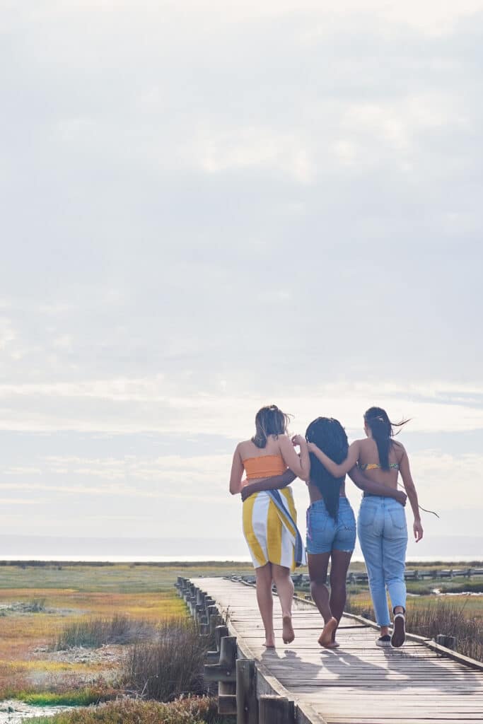 3 young women walking together