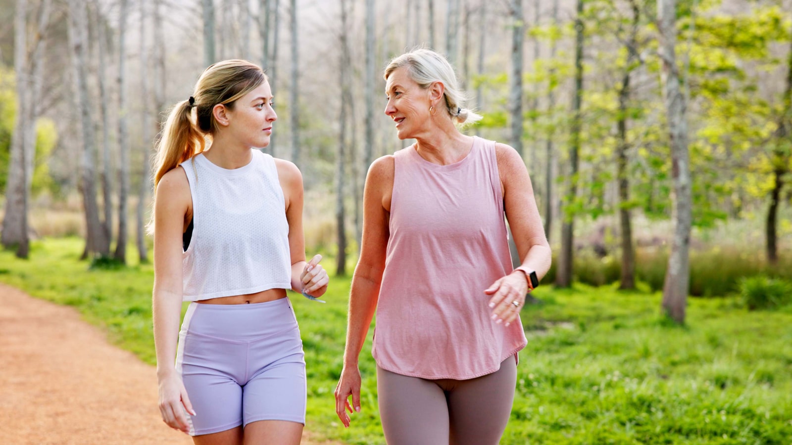 Image of a mother and daughter walking for fitness