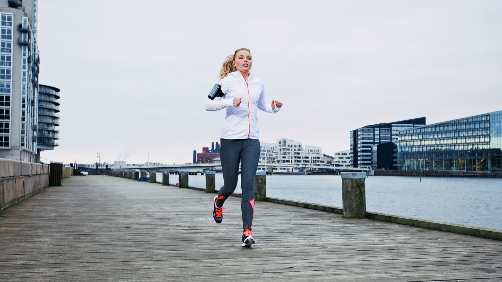 Image of a woman running and training for 10K