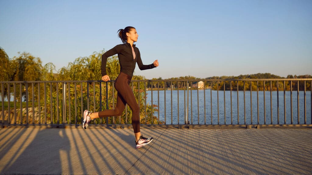 Image of a young woman running