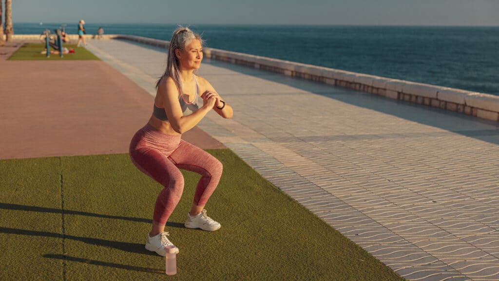 Image of a woman performing a squat