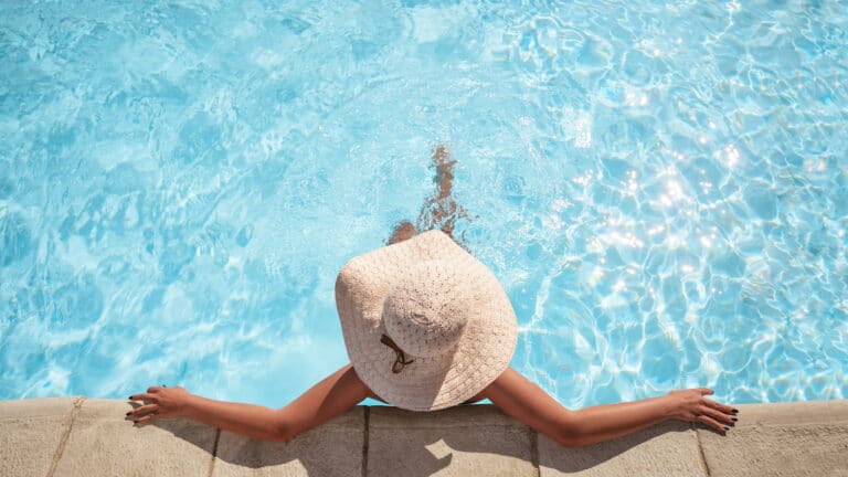 Woman relaxing in a pool